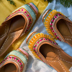Yellow lace work, beads work, sequins, threads bohemian handcrafted premium juttis.