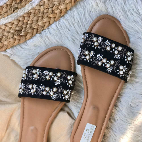 Handcrafted black sliders with zari embroidery and stylish pearl set embellishments.
