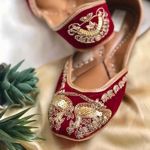 Ethnic handcrafted hand-embroidered maroon juttis delicately embroidered with zardozi, dabka, katdana and sequins for women.