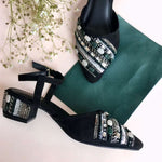 Stylish party wear ankle tie black block heels embroidered with stones, sequins, katdana and beads.