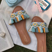 Stylish handcrafted sliders hand-embroidered using a unique variety of sequins, laces, katdana and beadwork.