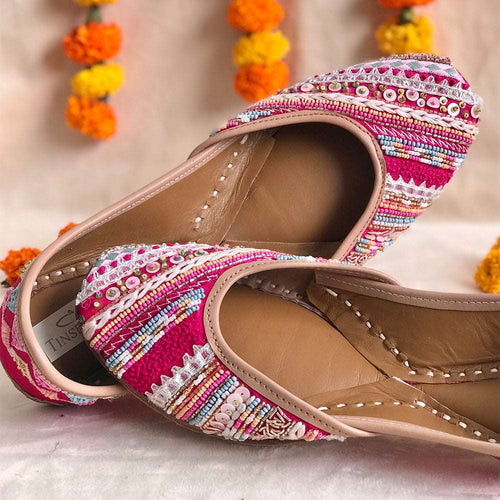 Festive wear Rani Pink premium handcrafted ethnic juttis embroidered with laces, katdana and stitchline detailings.