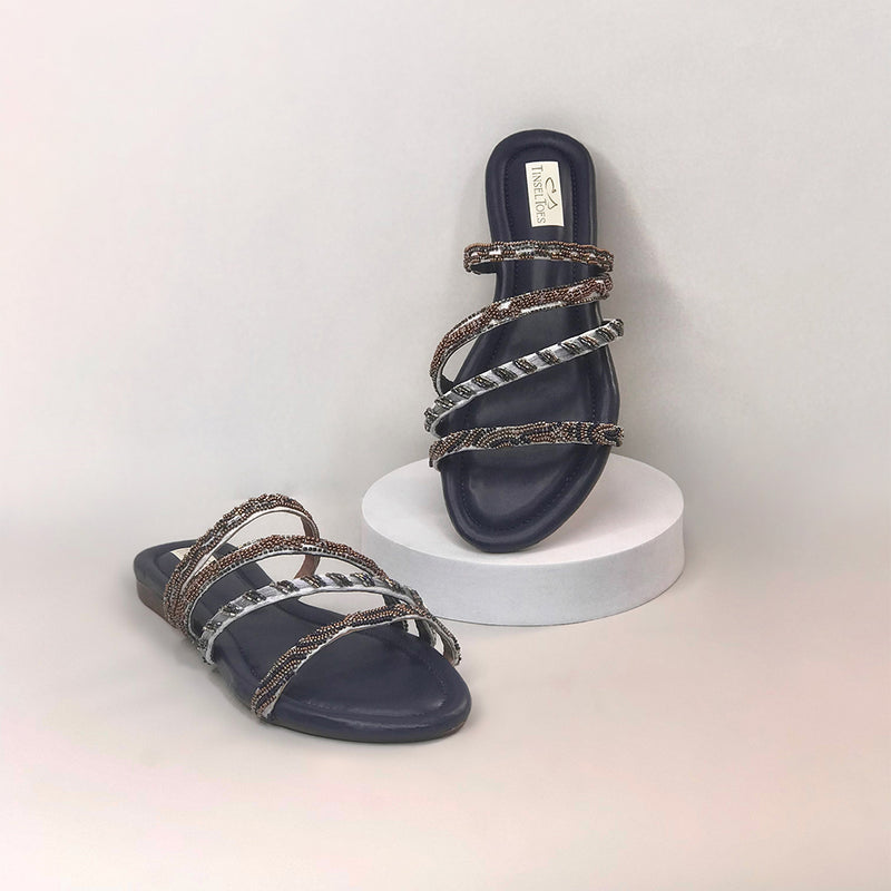 Stylish handcrafted copper and dark blue sliders hand-embroidered with katdana and beadwork.