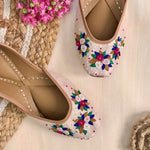 Handcrafted beautiful lustrous nude juttis embroidered with bullion and french knots for women.