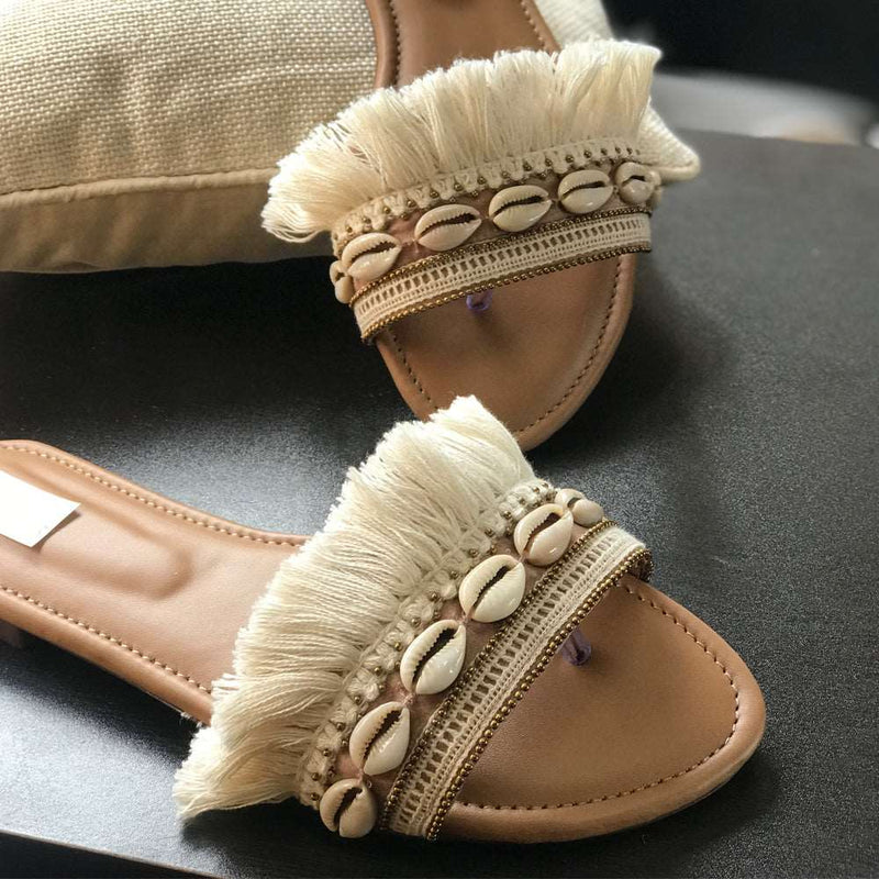 White and Beige stylish sliders embroidered with traditional sea shells and handcrafted laces.
