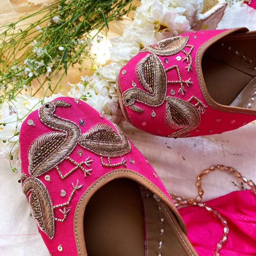 Ethnic handcrafted hand-embroidered hot pink juttis beautifully embroidered with zari, katdana, beadwork and sequins for women.