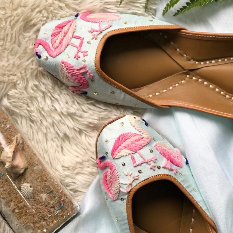 Ethnic handcrafted hand-embroidered pastel blue juttis beautifully embroidered with thread work and sequins for women.