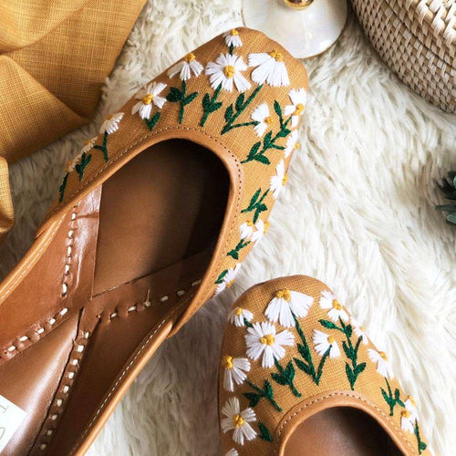 Ethnic handcrafted hand-embroidered mustard juttis with beautiful thread work white flowers for women.